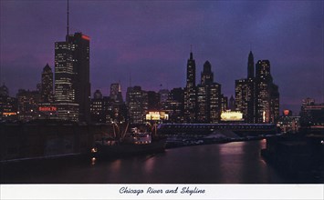 Chicago River and city skyline at night, Illinois, USA, 1957. Artist: Unknown