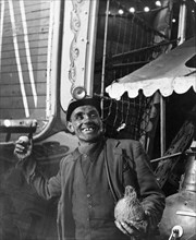 Miner at a fairground, Conisbrough, near Doncaster, South Yorkshire, 1955. Artist: Michael Walters