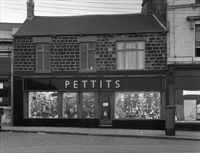 Front of Pettits Shoe Shop, Mexborough, South Yorkshire, 1960. Artist: Michael Walters
