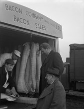 Buying wholesale meat from a Danish Bacon Company lorry, Barnsley, South Yorkshire, 1961. Artist: Michael Walters