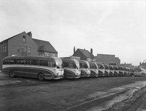 Fleet of Phillipson's coaches, Goldthorpe, South Yorkshire, 1963.  Artist: Michael Walters