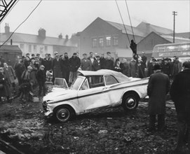 Sunbeam Rapier car accident, Kilnhurst, South Yorkshire, 1964.  Artist: Michael Walters.