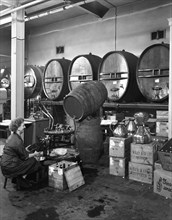 Whisky blending at Wiley & Co, Sheffield, South Yorkshire, 1960. Artist: Michael Walters