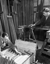 Packing drill bits and pneumatic bits at a steel foundry, Sheffield, South Yorkshire, 1962. Artist: Michael Walters