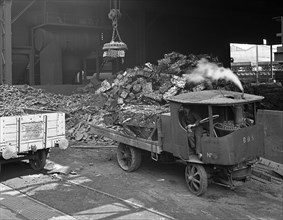 Loading a steam wagon with scrap at a steel foundry, Sheffield, South Yorkshire, 1965. Artist: Michael Walters