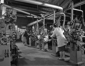 Female workers sharpening saw blades, Sheffield, South Yorkshire, 1963. Artist: Michael Walters