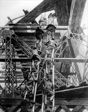 Gentlemen of the press taking the stairs on the Eiffel Tower, Paris, 1888. Artist: Unknown