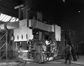 Arc furnace in operation, Sheffield, South Yorkshire, 1964.  Artist: Michael Walters