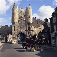 Tetley shire horses and dray in front of Micklegate Bar, York, North Yorkshire, 1969.  Artist: Michael Walters