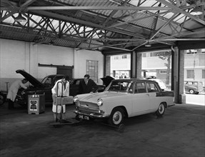 Scene in Globe & Simpson's auto electrical workshop, Nottingham, Nottinghamshire, 1961. Artist: Michael Walters