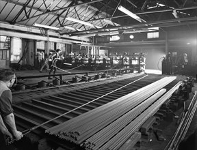 Rolling hexagonal rods, Edgar Allen Steel Foundry, Sheffield, South Yorkshire, 1962. Artist: Michael Walters