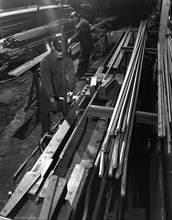 Drawing hexagonal rods, Edgar Allen Steel Foundry, Sheffield, 1962.  Artist: Michael Walters