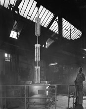 Vertical heat treatment process, Edgar Allen Steel Foundry, Sheffield, South Yorkshire, 1962. Artist: Michael Walters