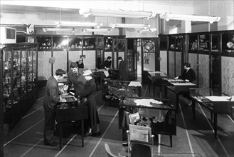 Customers in the Barnsley Co-op jewellery department, South Yorkshire, 1957.   Artist: Michael Walters