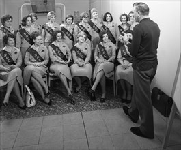 Australian sales girls with SPL sashes listen to a sales talk, Selby, North Yorkshire, 1965. Artist: Michael Walters
