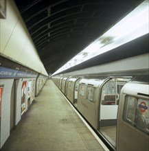 Tube train standing at Blackhorse Road station on the Victoria Line, London, 1974.  Artist: Michael Walters