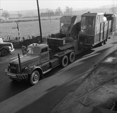 Early 1940s Diamond T truck pulling a large load, South Yorkshire, 1962. Artist: Michael Walters