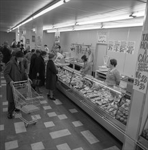 The meat counter at the ASDA supermarket in Rotherham, South Yorkshire, 1969.  Artist: Michael Walters