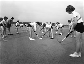 Girls hockey match, Airedale school, Castleford, West Yorkshire, 1962. Artist: Michael Walters