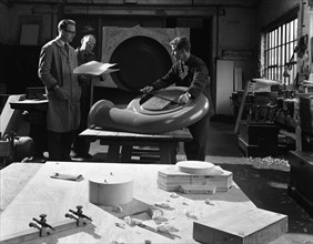 Quality checking a casting for a pump, Rotherham, South Yorkshire, 1963. Artist: Michael Walters
