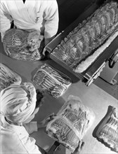 Packing bacon rashers, Danish Bacon Company, Selby, North Yorkshire, 1964. Artist: Michael Walters