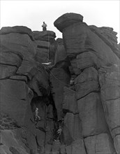 Climbers on Stanage Edge, Hathersage, Derbyshire, 1964.  Artist: Michael Walters