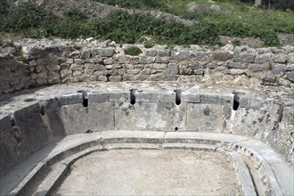 The latrine at the Baths of the Cyclopes, Dougga (Thugga), Tunisia. Artist: Samuel Magal