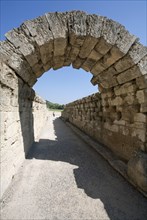 A vaulted passageway linking the stadium to the Altis in Olympia, Greece. Artist: Samuel Magal