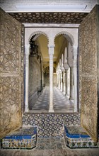 View to the courtyard through a mullioned window, House of Pilate, Seville, Andalusia, Spain, 2007. Artist: Samuel Magal