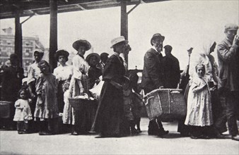 Immigrants arriving at Ellis Island, New York City, USA, c1905. Artist: Unknown