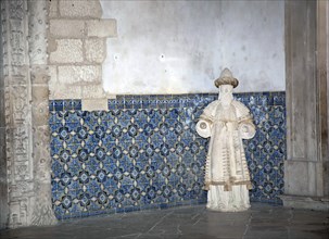 Statue and azulejo tiles, Monastery of Alcobaca, Alcobaca, Portugal, 2009.  Artist: Samuel Magal
