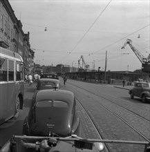 Heavy traffic outside the Royal Palace, Stockholm, Sweden, 1950. Artist: Torkel Lindeberg