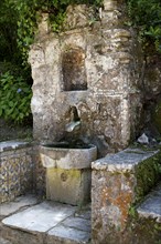 A fountain in Capuchos Convent, Sintra, Portugal, 2009. Artist: Samuel Magal
