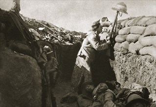 A Royal Irish Fusilier teases a Turkish sniper, Gallipoli, Turkey, World War I, c1915-c1916. Artist: Unknown