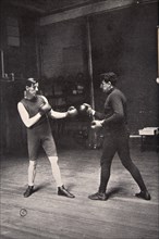 James J Corbett, American boxer, training with Jim Kennedy, 1900. Artist: Unknown