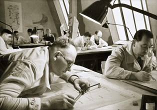 A drawing office scene, where new plans for fresh works are drawn up, Germany, 1936. Artist: Unknown