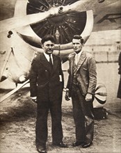 Aviators Wiley Post and Harold Gatty in front of 'Winnie Mae', New York, USA, 1931. Artist: S and G