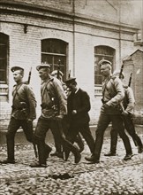A patrol hunting down suspects following the revolt at Vyborg, Russia, early 20th century. Artist: Unknown