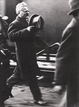 Leon Trotsky, exiled Russian Communist leader, arriving in Paris, c1933. Artist: Unknown