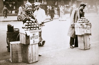Jobless New Yorkers selling apples on the pavement, Great Depression, New York, USA, 1930. Artist: Unknown