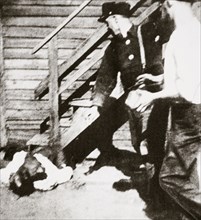 Two white men stoning an African American to death, 1919. Artist: Unknown