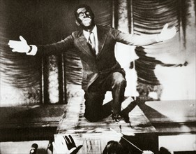 Al Jolson, American singer, in the final scene from the film 'The Jazz Singer', 1927. Artist: Unknown