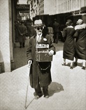 Blind man begging, Great Depression, New York, USA, 1933. Artist: Unknown