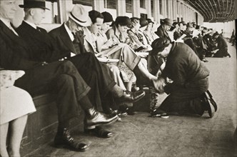 Shoe shiners working on board the Staten Island Ferry, New York, USA, c1920s-c1930s. Artist: Unknown
