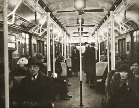 Interior of an Eighth Avenue subway carriage, New York, USA, early 1930s. Artist: Unknown