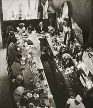 Office workers having lunch at the drug store counter, New York, USA, c1920s-c1930s. Artist: Unknown