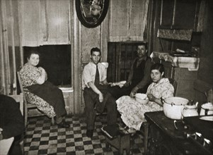 Residents of a tenement, Henry Street, Lower East Side, Manhattan, New York, USA, early 1930s. Artist: Unknown