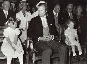 King Carl XVI Gustav of Sweden with Princess Victoria and Prince Carl Philip, 1982. Artist: Unknown