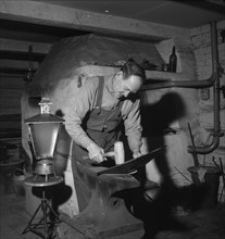 Blacksmith at work, Esklistuna, Södermanland, Sweden, 1960. Artist: Torkel Lindeberg