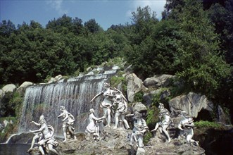 Sculpture by a cascade, Palace of Caserta, Campania, Italy.